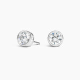 Certified 14 Karat White Gold Round Bezel Set Lab Grown Diamond Stud Earrings (starting at 0.50 carat )