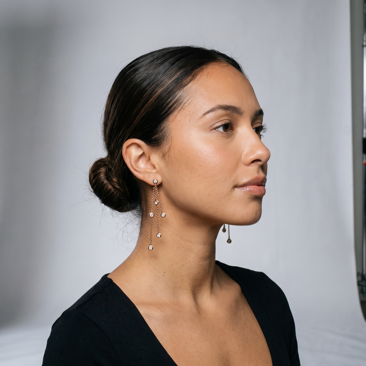 Diamond By The Yard 12-Stone Dangling Earrings on model - studio photoshoot